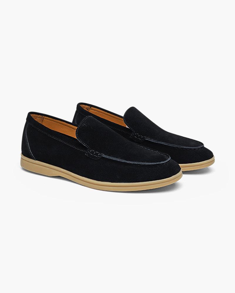 Unisex slip-on loafers with moccasin stitching and low heels