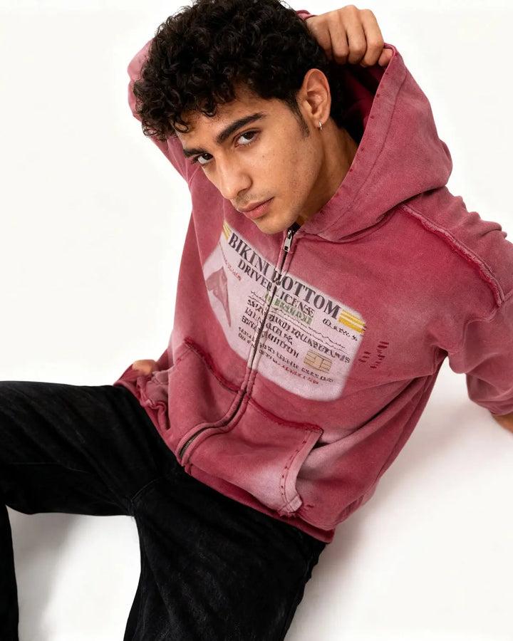 Unisex graphic zip-up hoodie with hood, printed chest design and front pockets