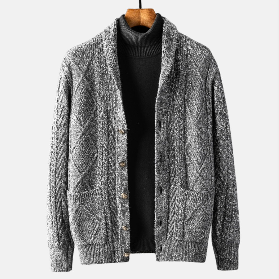 Cable knit cardigan with shawl collar, button front and patch pockets