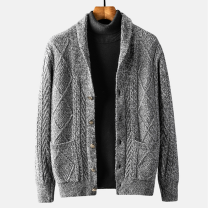 Cable knit cardigan with shawl collar, button front and patch pockets