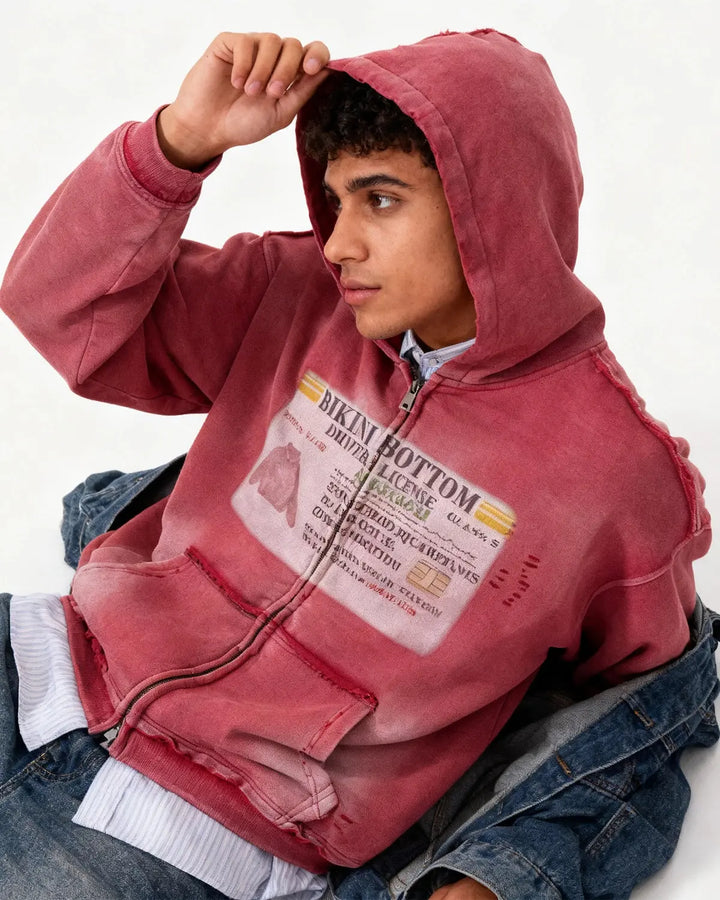 Unisex graphic zip-up hoodie with hood, printed chest design and front pockets