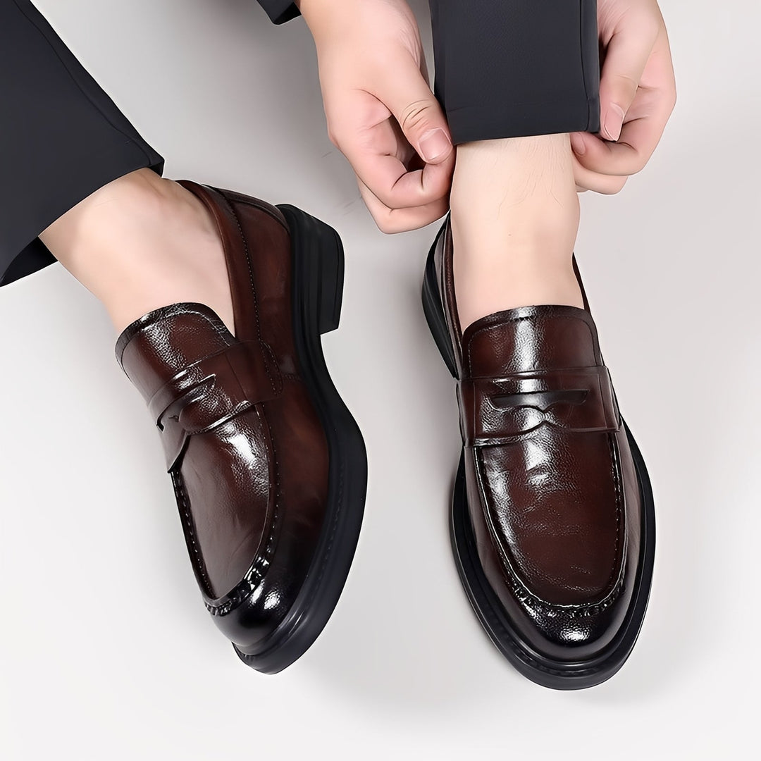 Men's formal loafers with moc toe stitching, penny strap and low heel
