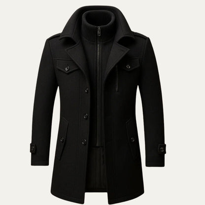 Men's long structured button coat with raised collar, chest pockets and cuff tabs