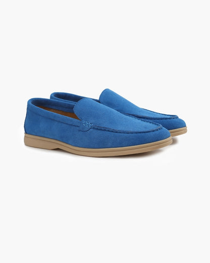 Unisex slip-on loafers with moccasin stitching and low heels