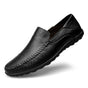 Men's slip-on loafer with moccasin stitching, perforated detail and textured flat sole