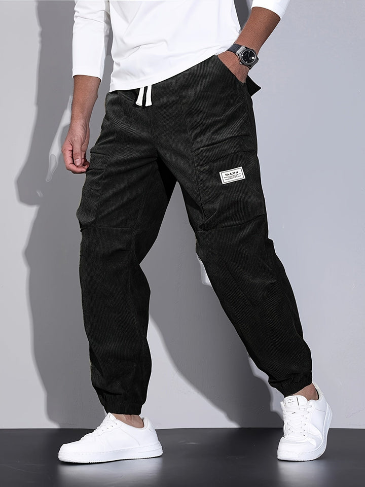 Men's corduroy cargo trousers with tapered legs and elasticated cuffs