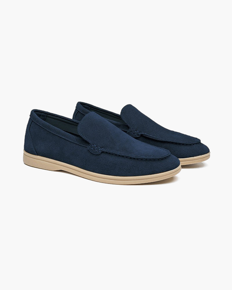 Unisex slip-on loafers with moccasin stitching and low heels