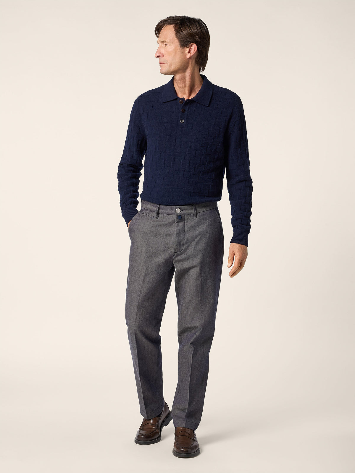 Unisex houndstooth polo shirt with a collared neckline