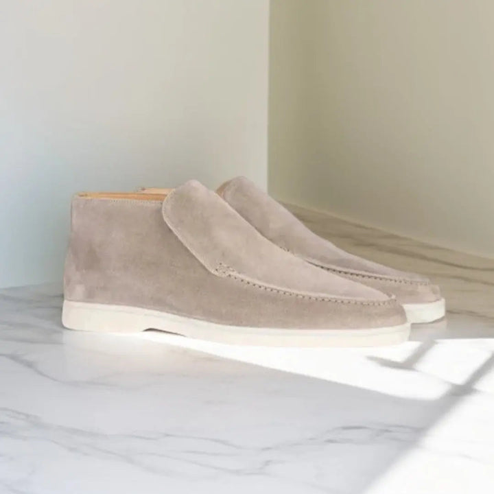 Men's slip-on loafers with stitched moccasin detailing and flat contrasting soles