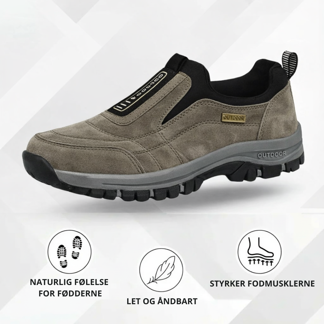 Unisex slip-on outdoor shoes with stitched panels, pull tab and chunky treaded sole