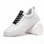 Low lace-up trainers with stitched panels, round toes and flat textured soles