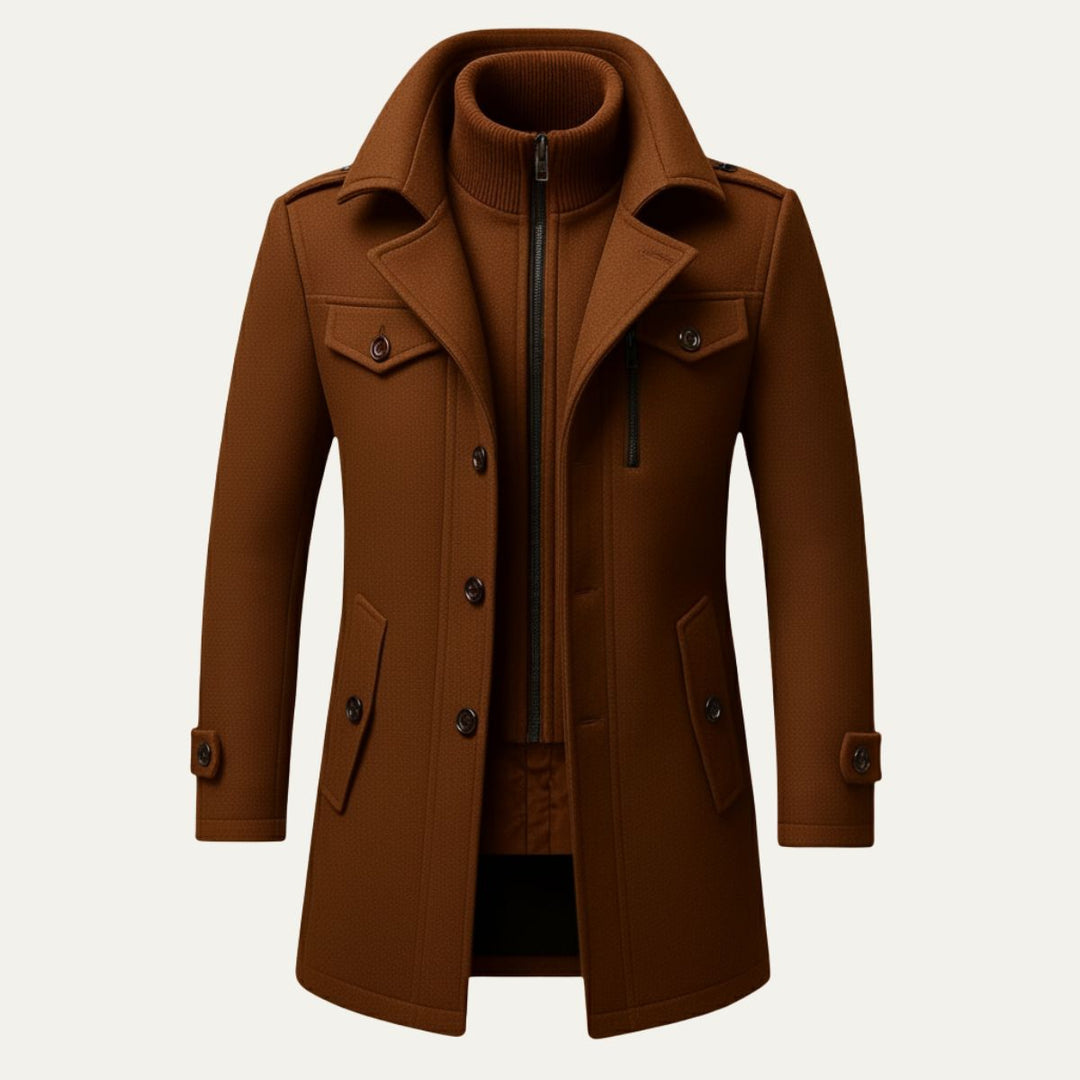 Men's long structured button coat with raised collar, chest pockets and cuff tabs