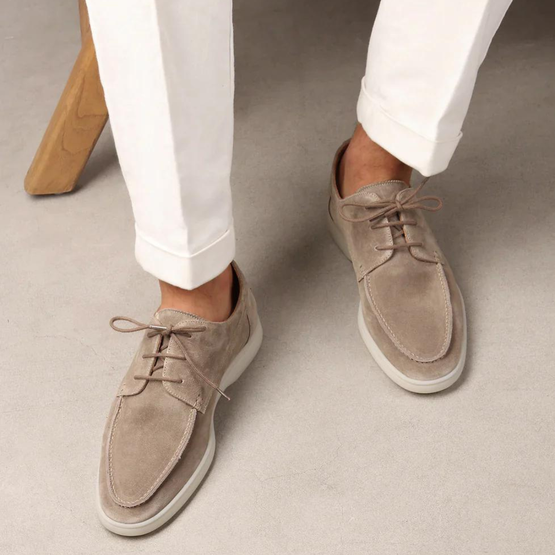 Men's lace-up loafers with moc toe stitching and contrasting sole