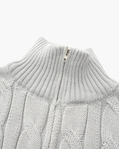 Cable-knit half-zip sweater with ribbed mock neck, cuffs and hem