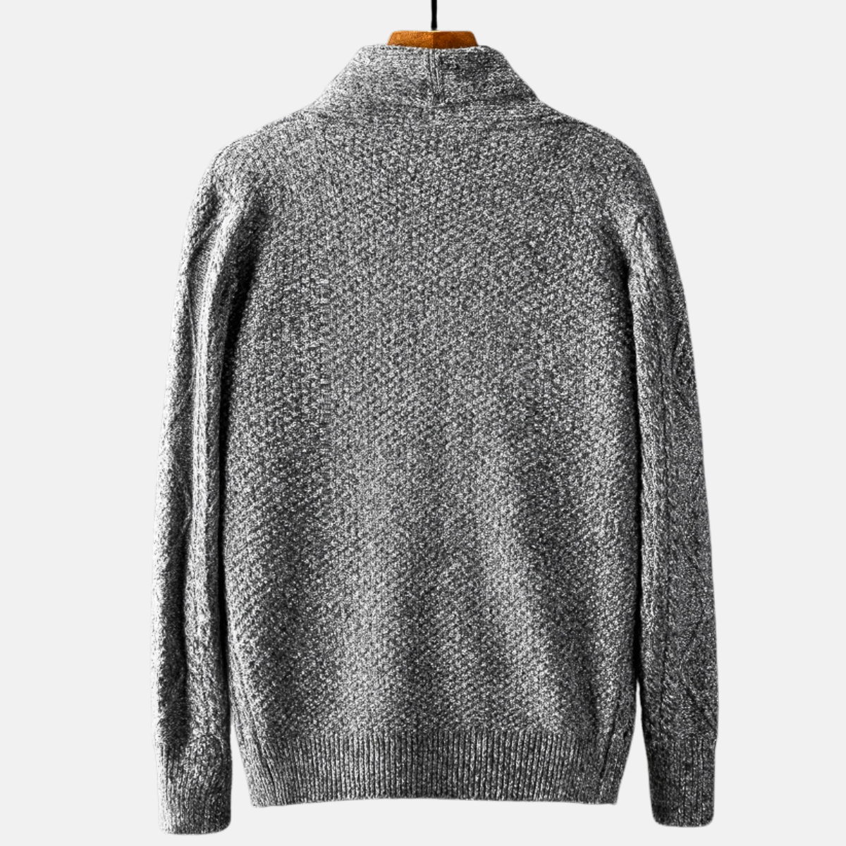 Cable knit cardigan with shawl collar, button front and patch pockets