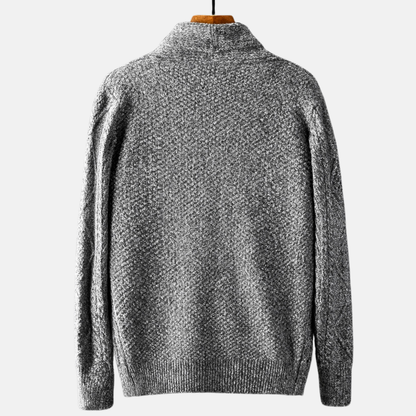 Cable knit cardigan with shawl collar, button front and patch pockets