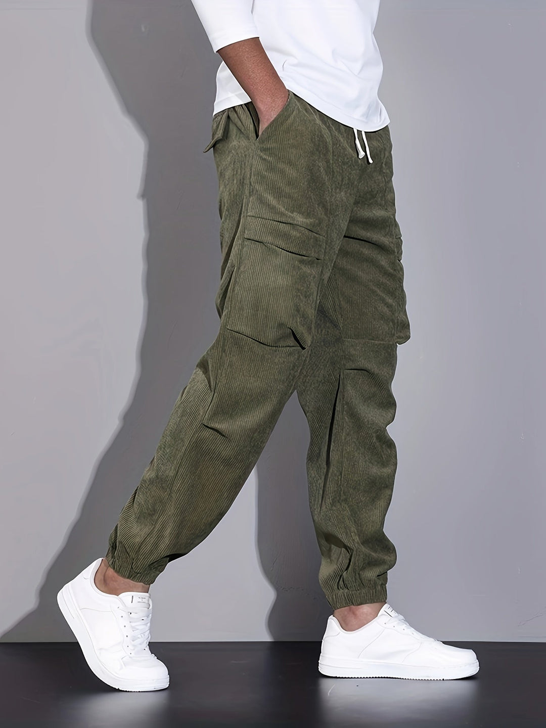 Men's corduroy cargo trousers with tapered legs and elasticated cuffs