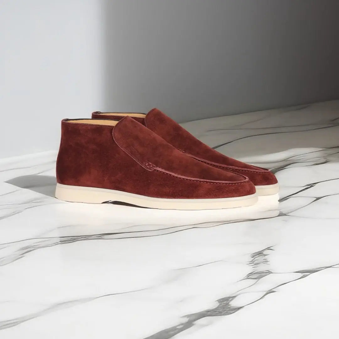 Men's slip-on loafers with stitched moccasin detailing and flat contrasting soles