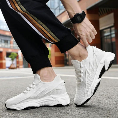 Men's lace-up trainers with a raised sole and panelled upper