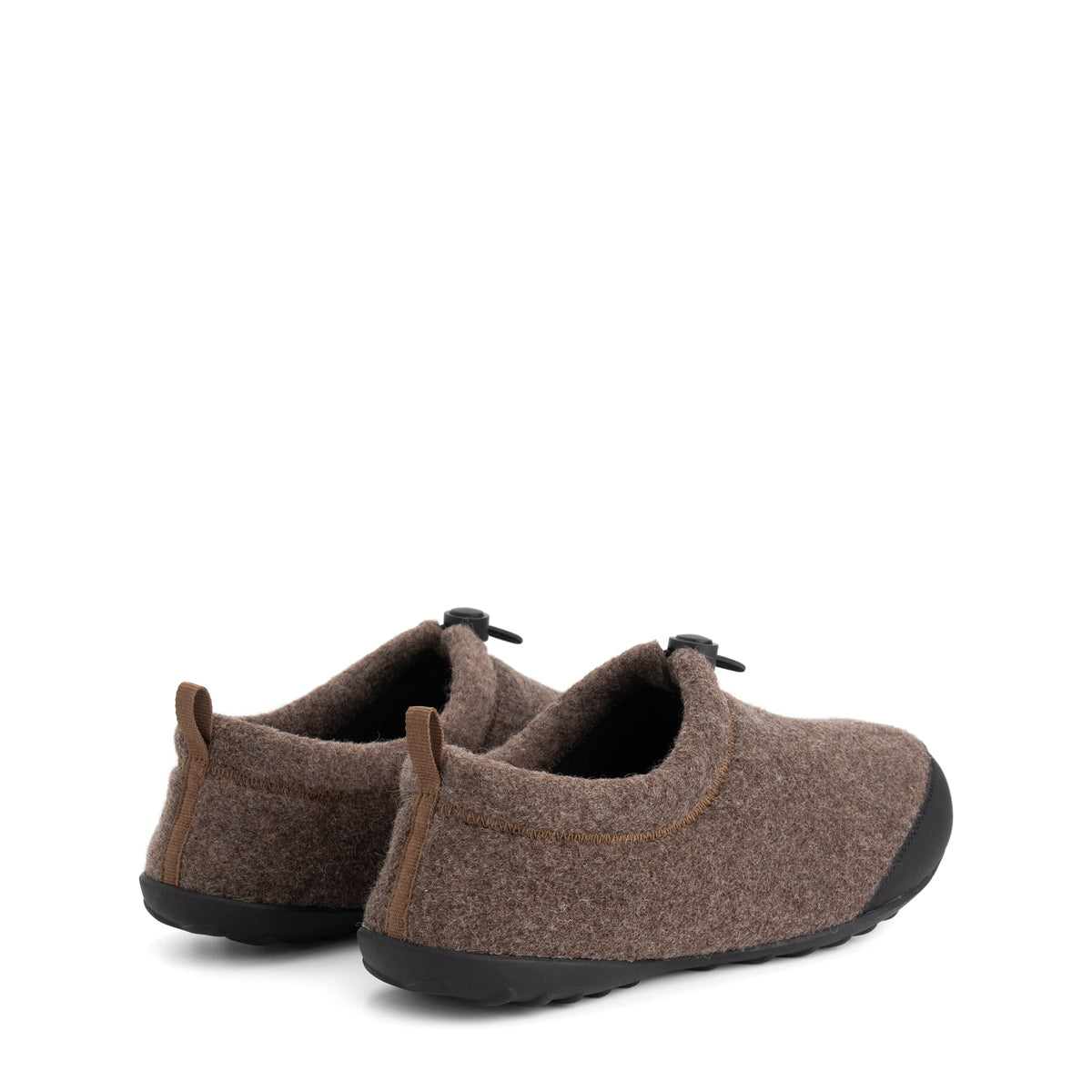 Brown house slippers with black toe panels, toggle closures and flat textured soles