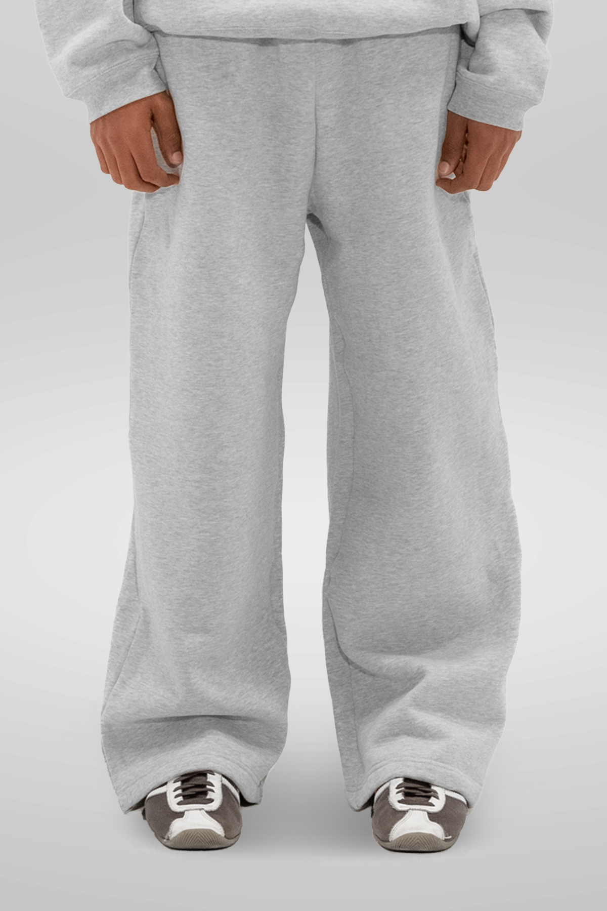 Light grey wide-leg sweatpants with an elastic waistband