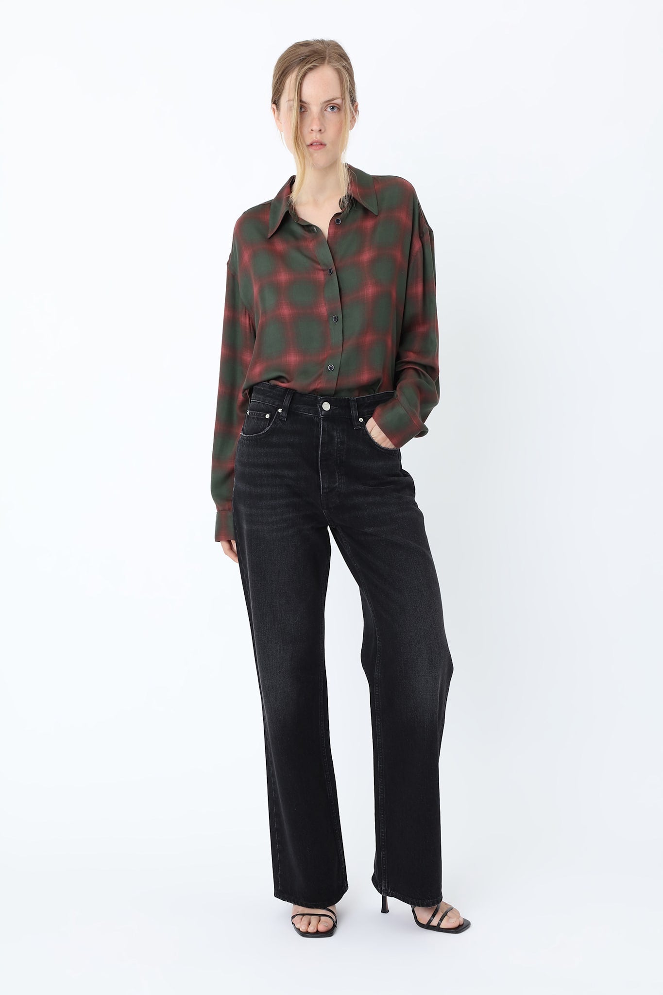 Women's black straight-leg jeans with high rise and five-pocket design