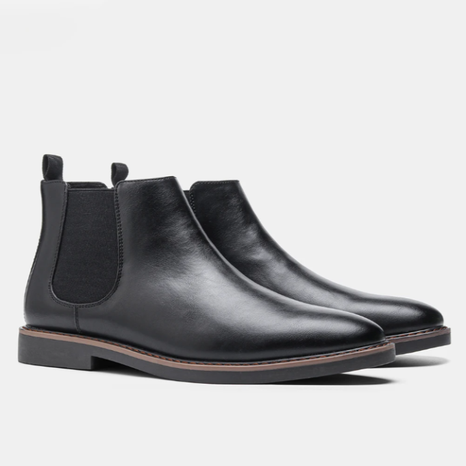 Unisex Chelsea boots with elastic side panels, pull tabs and low heels