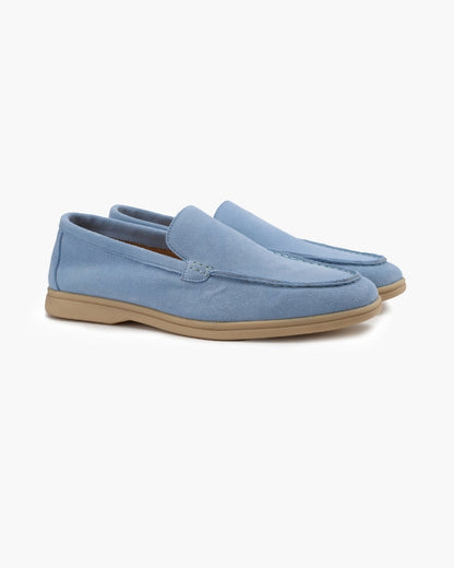 Unisex slip-on loafers with moccasin stitching and low heels