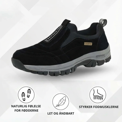 Unisex slip-on outdoor shoes with stitched panels, pull tab and chunky treaded sole