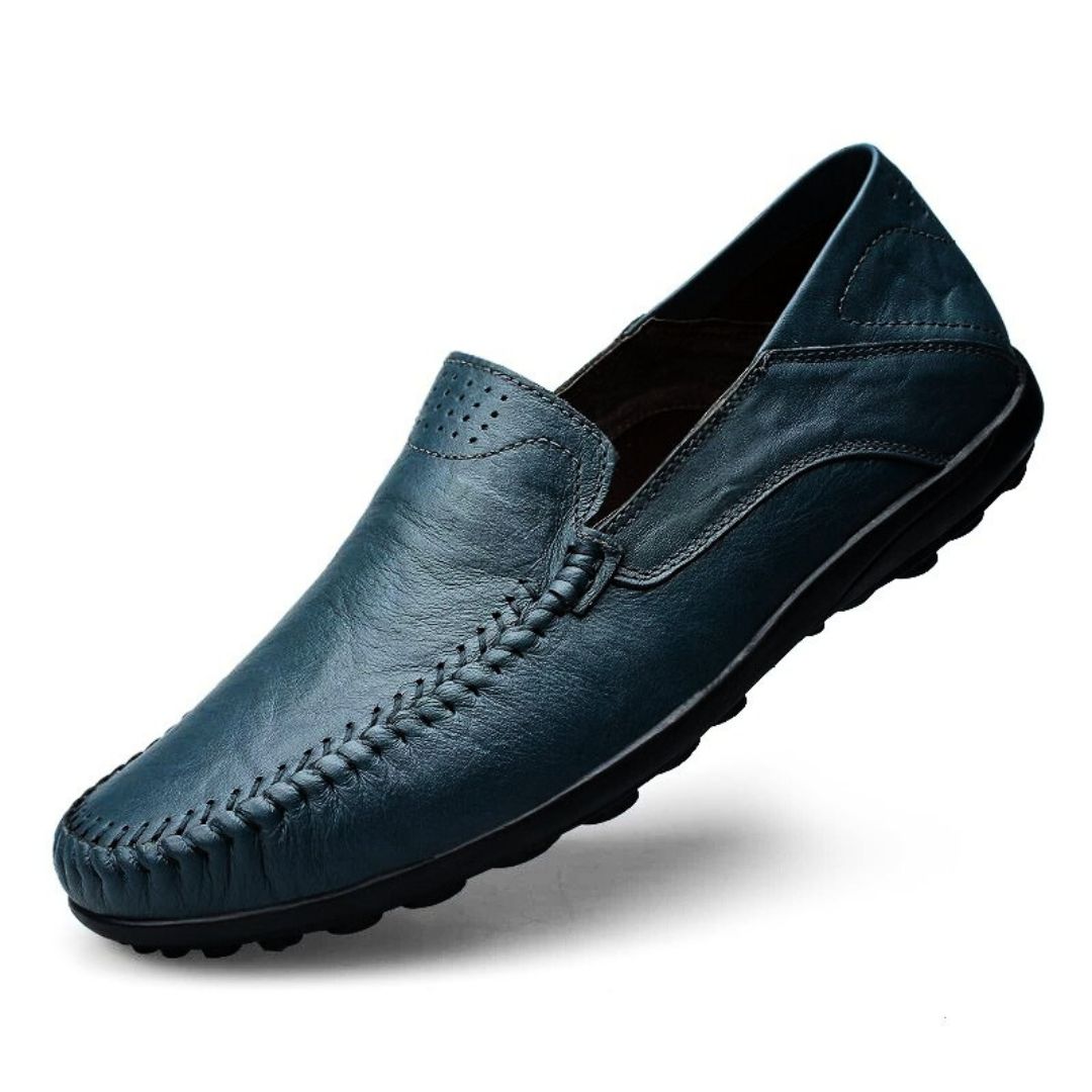 Men's slip-on loafer with moccasin stitching, perforated detail and textured flat sole
