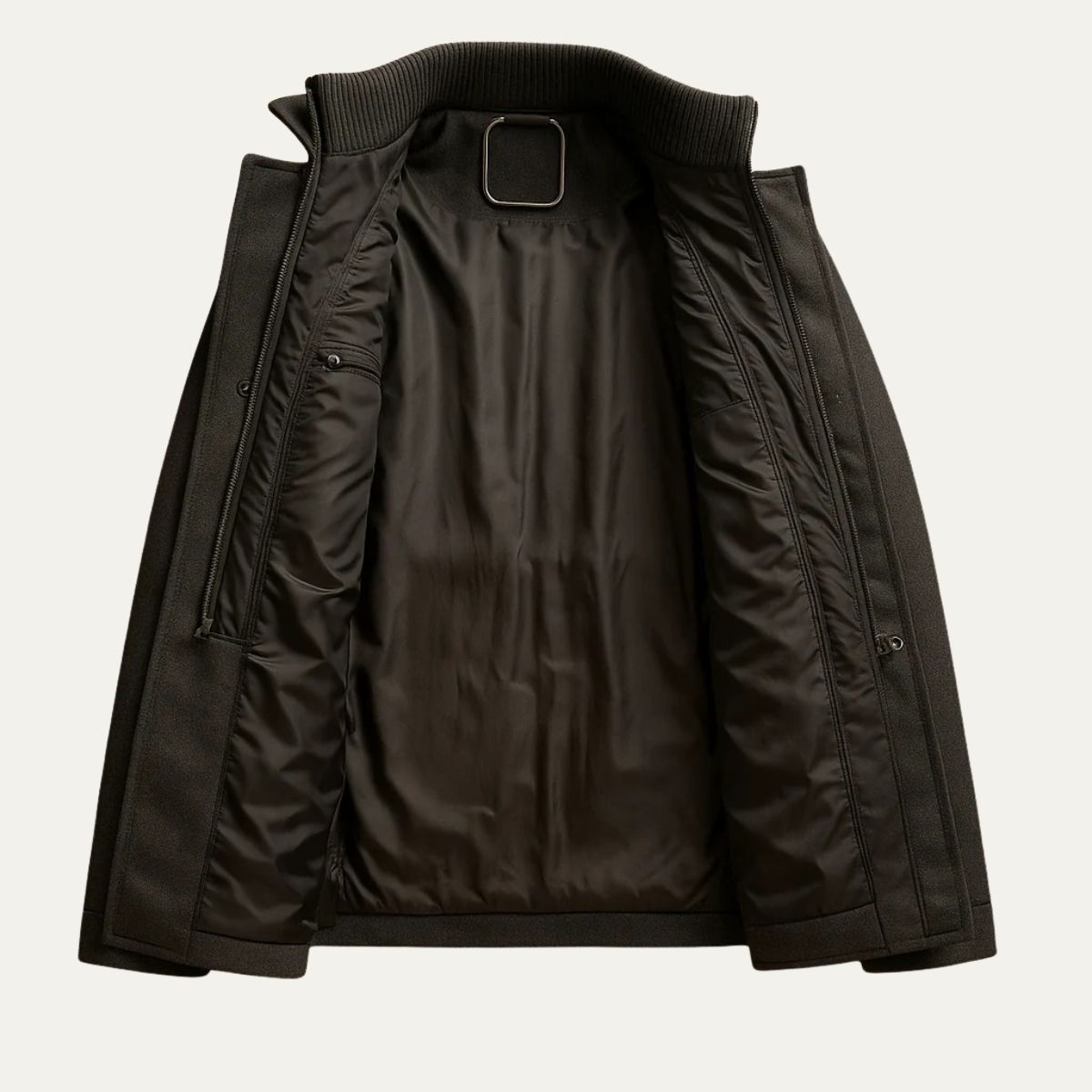 Men's long structured button coat with raised collar, chest pockets and cuff tabs