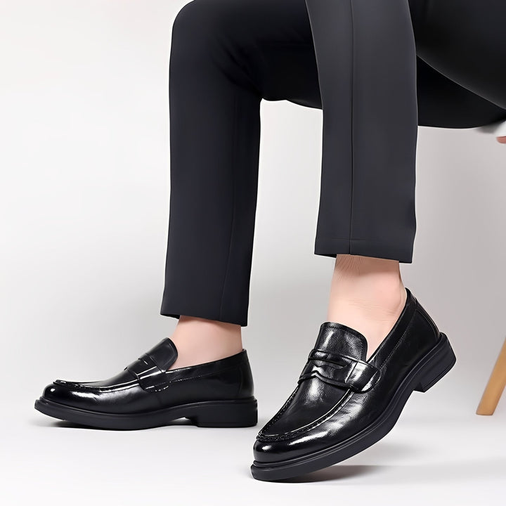 Men's formal loafers with moc toe stitching, penny strap and low heel