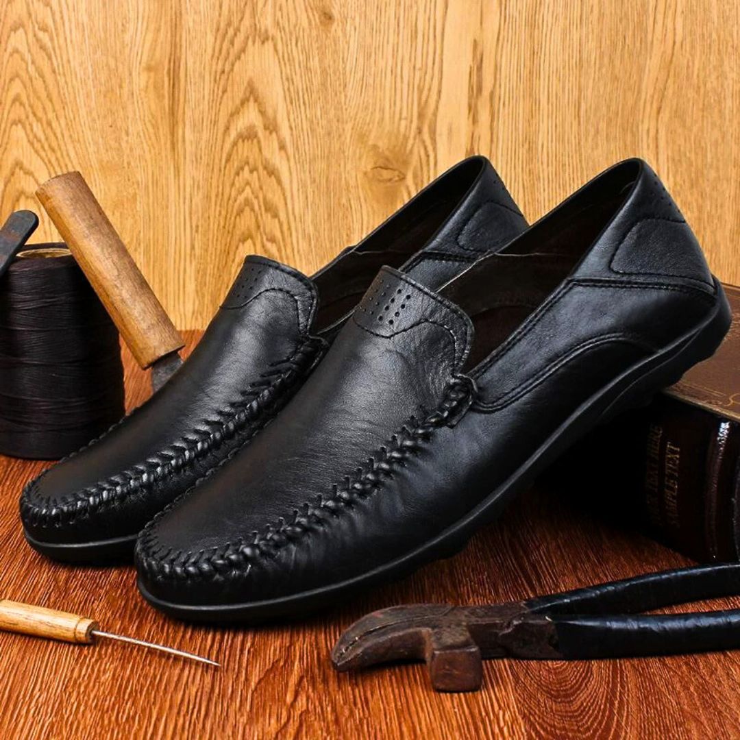 Men's slip-on loafer with moccasin stitching, perforated detail and textured flat sole