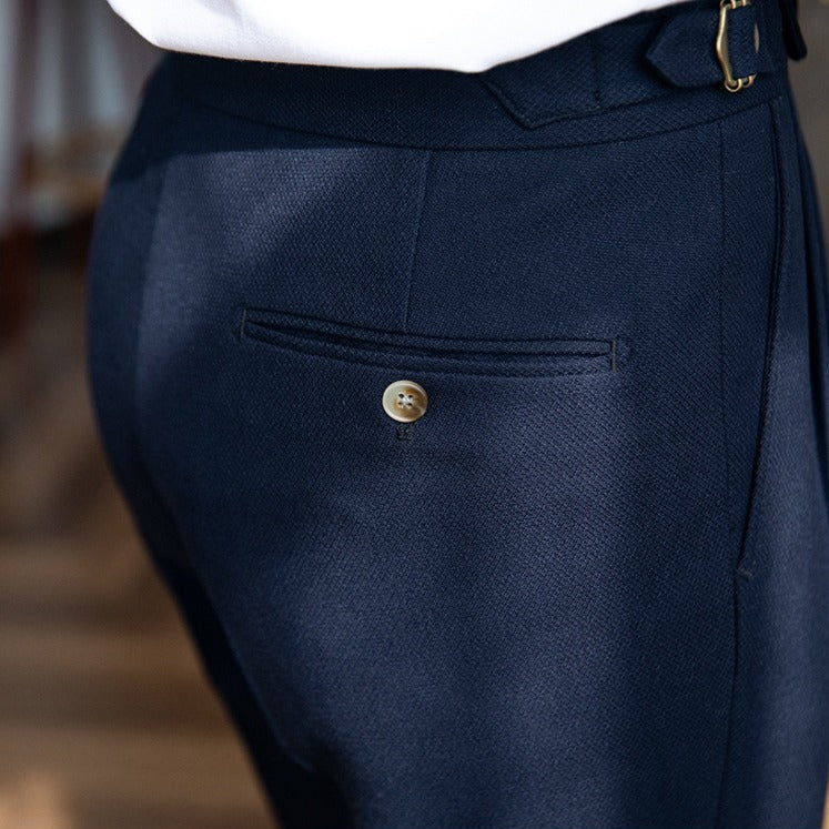 Men's double pleat trousers with side tabs and cuffed hems