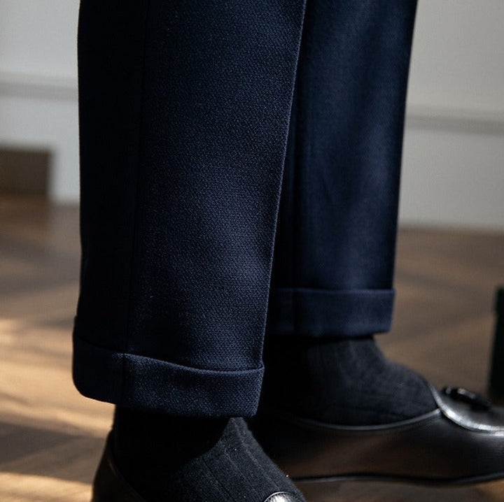 Men's double pleat trousers with side tabs and cuffed hems