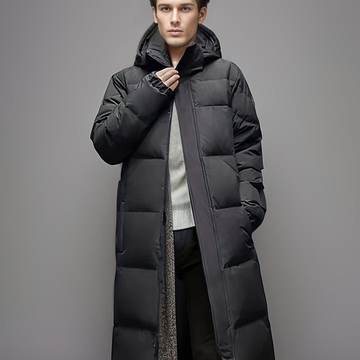 Men's black long hooded puffer coat with quilted panels