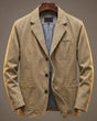 Washed blazer with notched lapels, button front, long sleeves and patch pockets