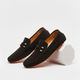 Men's perforated slip-on loafers with decorative vamp detail and flat ridged soles
