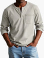 Men's long-sleeve Henley shirt with round neckline, button placket and chest pocket