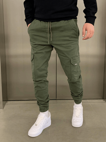 Men's tapered cargo trousers with drawstring waist, thigh pockets and elasticated cuffs