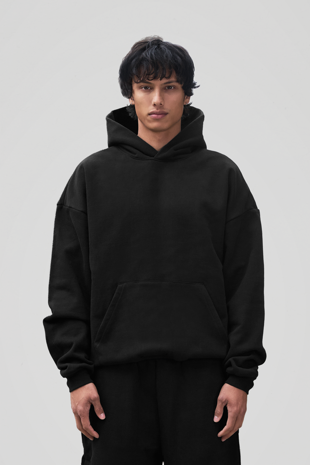 Men's black hooded sweatshirt with long sleeves and front pouch pocket