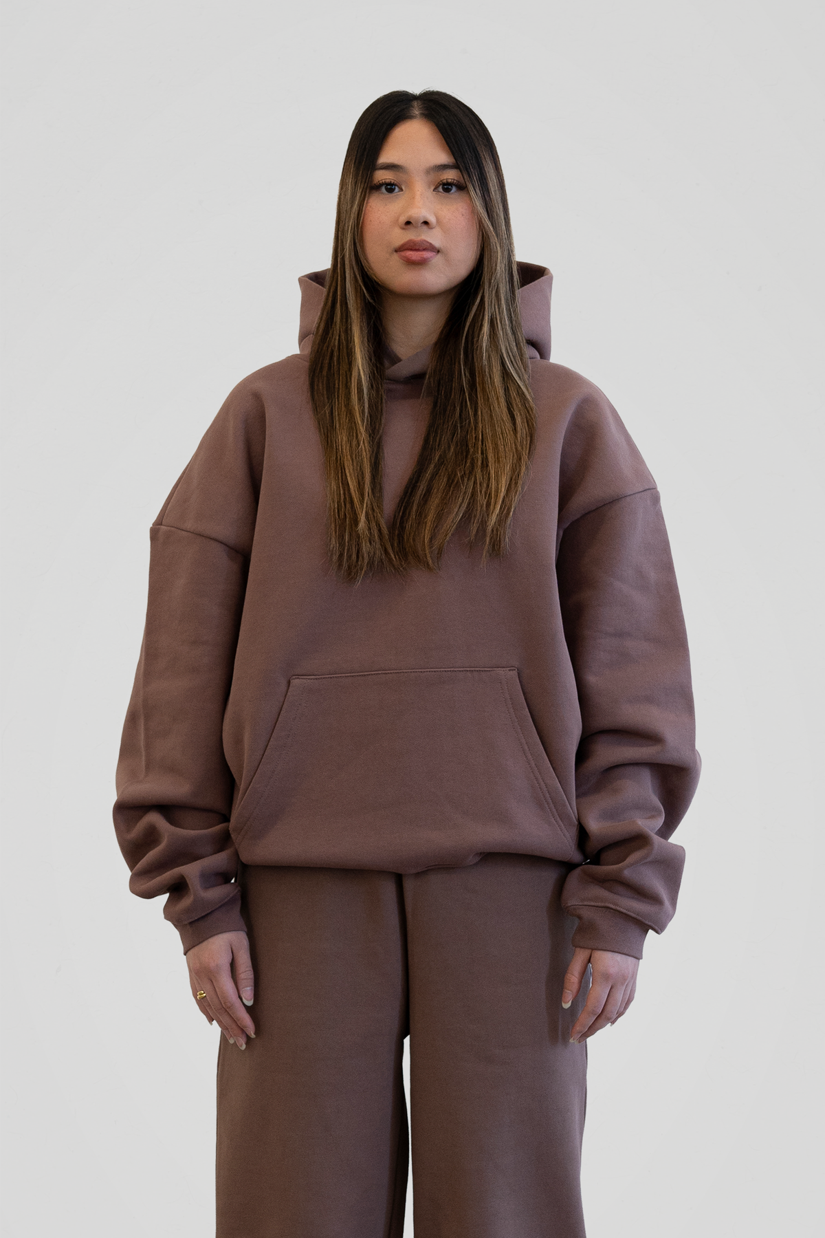 Brown long-sleeve pullover hoodie with hood and front kangaroo pocket