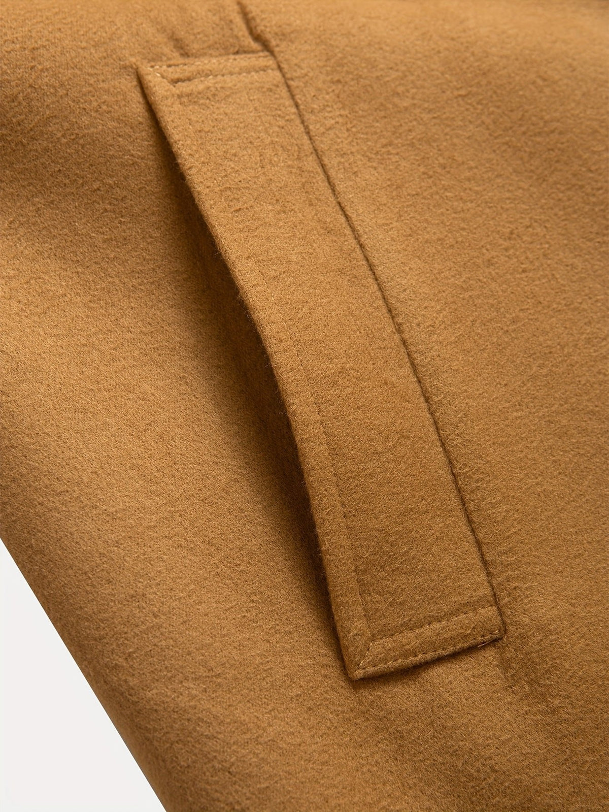 Men's tailored longline trench coat with lapels, buttons and angled side pockets