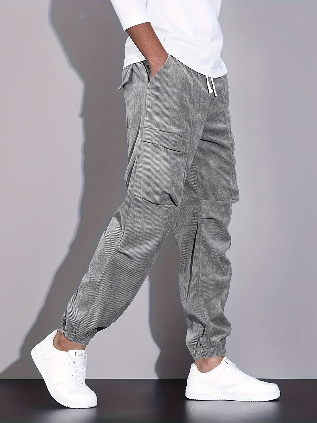 Men's corduroy cargo trousers with tapered legs and elasticated cuffs