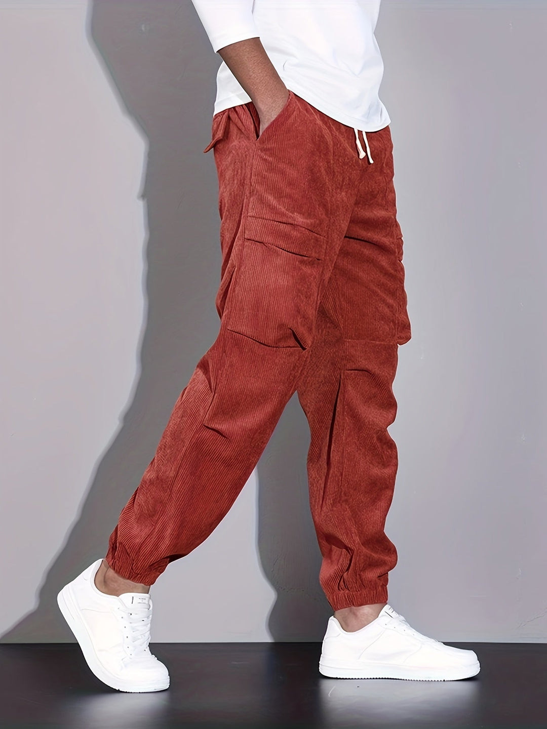 Men's corduroy cargo trousers with tapered legs and elasticated cuffs