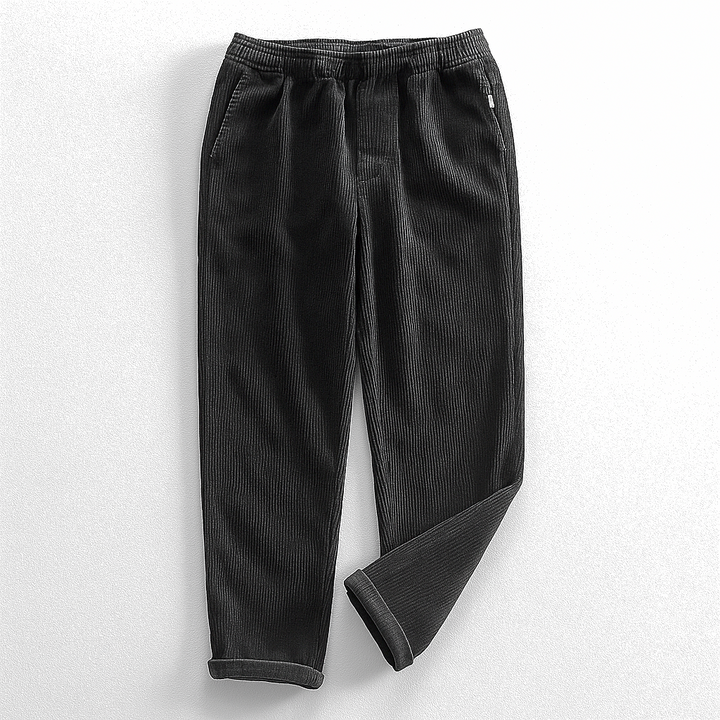 Corduroy pants with elastic waist, side pockets and tapered legs