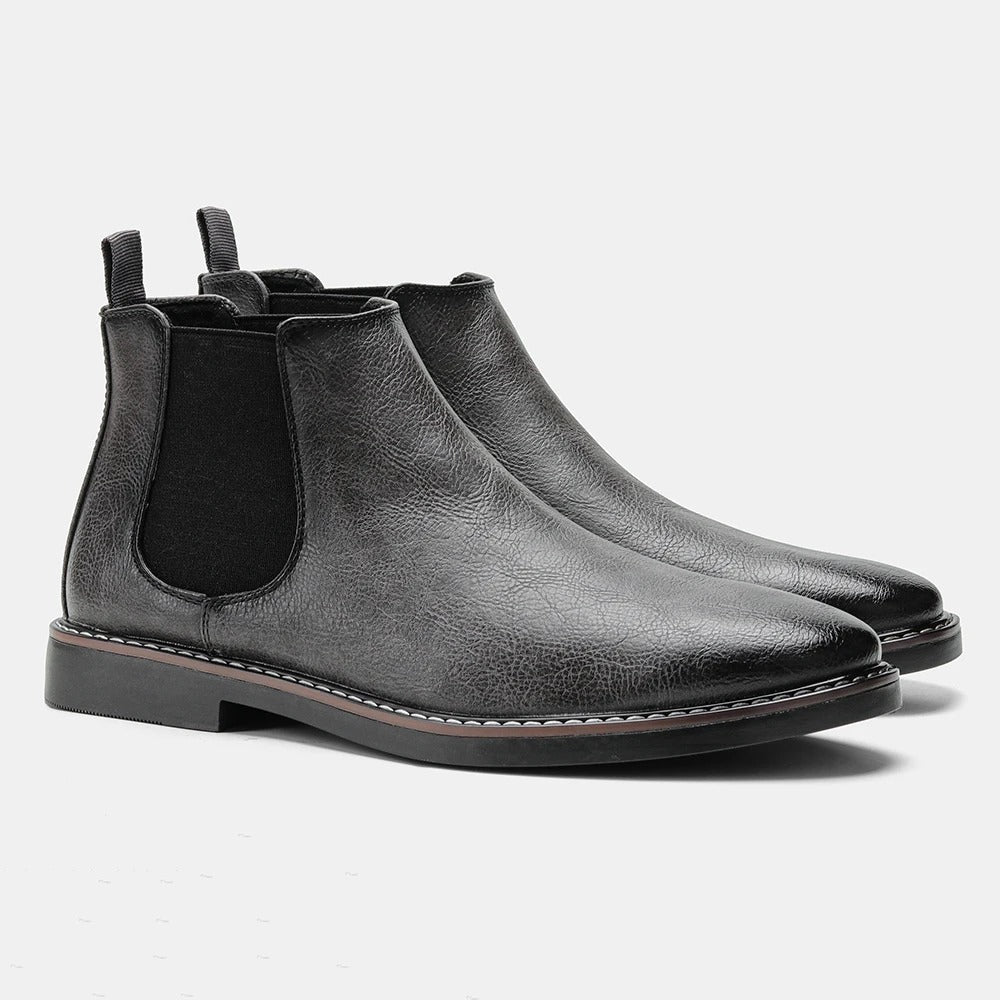 Men's Chelsea boots with elastic side panels, almond toes and flat soles