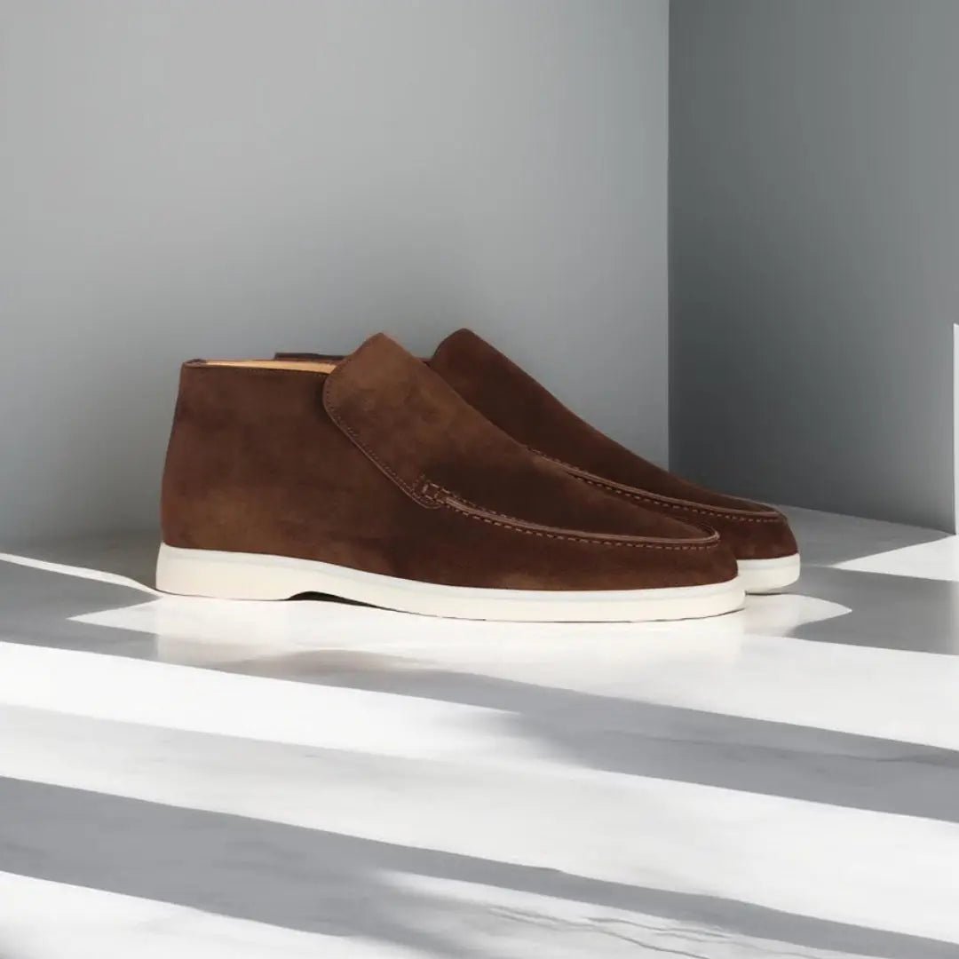 Men's slip-on loafers with stitched moccasin detailing and flat contrasting soles
