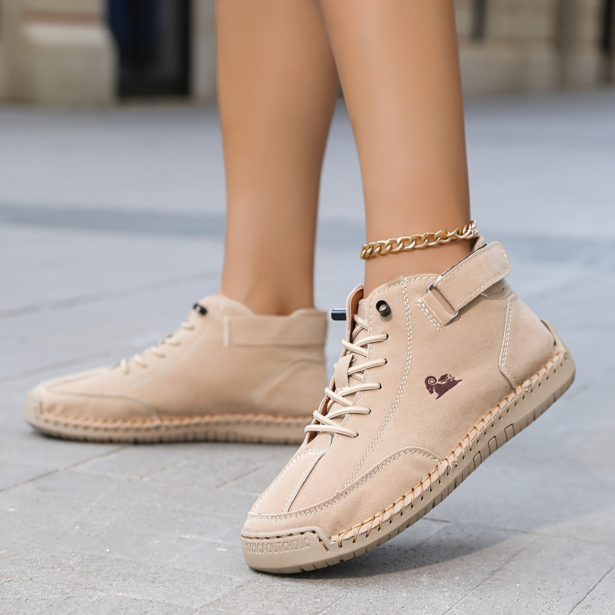 Ankle high lace-up sneakers with stitched panels, ankle strap and contrast sole