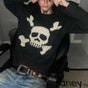 Men's black knitted sweater with cream skull and crossbones motif